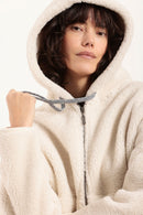 Blouson à capuche sherpa