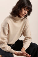 Pull col roulé en laine merinos et cachemire